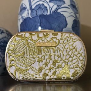 Lilly Pulitzer Clutch with attachable chain.